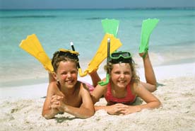 [More children on the beach, Pamela Anderson not shown]